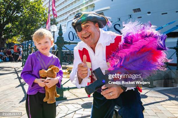 In this image released on March 26, 2024 The Wiggles, Wiggly Friends and Captain Feathersword in front of Royal Caribbean's Ovation of the Seas in...