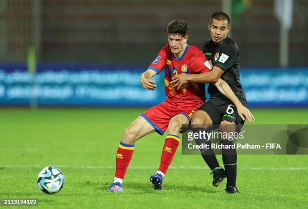 Joel Guillen Garcia of Andorra battles for possession with Robson Matheus Tome De Araujo Benegas of Bolivia during the FIFA Series 2024 Algeria match...