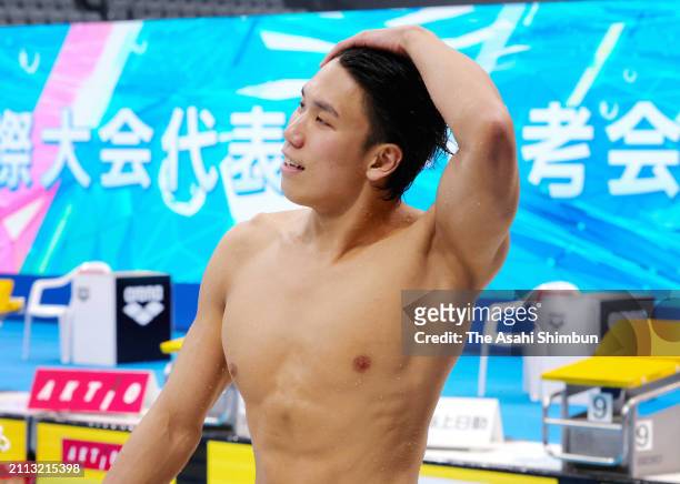 Katsuhiro Matsumoto celebrates qualifying for the Paris Olympics after competing in the Men's 100m Butterfly final during day eight of the Swimming...
