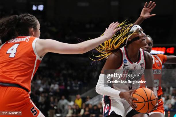 Aaliyah Edwards of the Connecticut Huskies drives to the rim against the Syracuse Orange during the first half of a second round NCAA Women's...