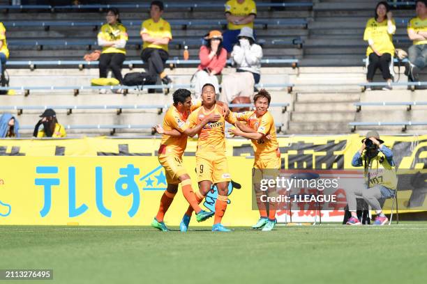 Jong Tae-se of Shimizu S-Pulse celebrates with teammates Freire and Shota Kaneko after scoring the team's first goal during the J.League J1 match...