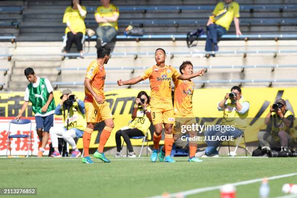 Jong Tae-se of Shimizu S-Pulse celebrates with teammates Freire and Shota Kaneko after scoring the team's first goal during the J.League J1 match...