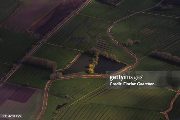 This aerial view of field near the river Elbe is pictured on March 25, 2024 in Berlin, Germany.