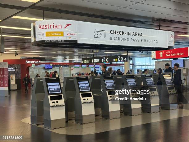 Closed check-in counters are seen at the Schwechat International Airport as cabin crews working at Austrian Airlines go on strike after 17 salary...