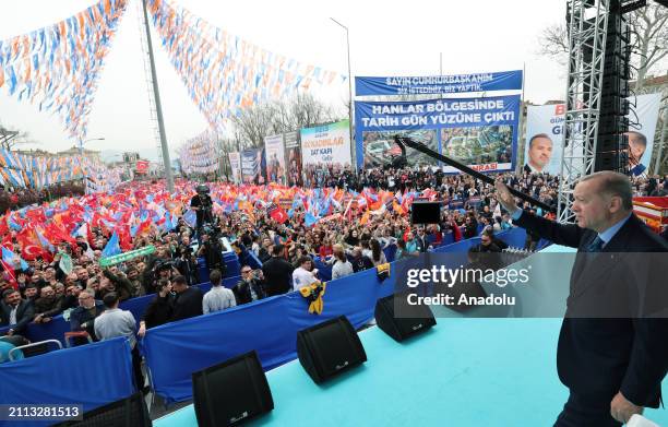 Turkish President and Leader of Justice and Development Party Recep Tayyip Erdogan greets crowd during his party's election rally prior to the...