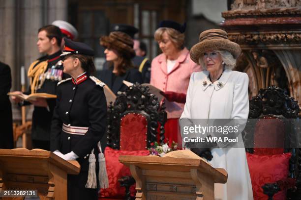 Britain's Queen Camilla attends the Royal Maudy Service where she distributes the Maundy money to 75 men and 75 women, mirroring the age of the...