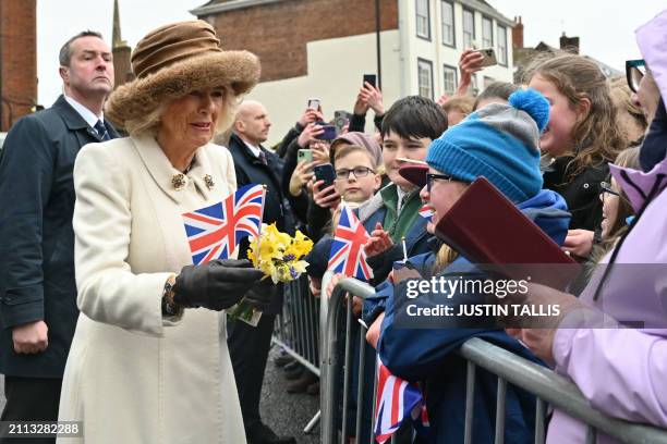 Britain's Queen Camilla meets well-wishers after attending the Royal Maundy Service where she distributed the Maundy money to 75 men and 75 women,...