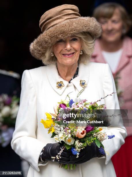 Queen Camilla leaves after The Royal Maundy Service at Worcester Cathedral on March 28, 2024 in Worcester, England. Queen Camilla distributed the...