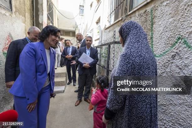 Foreign minister Hadja Lahbib pictured during a visit to the Palestinian refugee camp Al Am'ari, with UNRWA, on the West Bank, on day two of a...