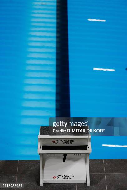 This photograph taken on March 28, 2024 shows a diving board on the edge of a swimming pool, in the Aquatics Centre built for the Paris 2024 Olympic...