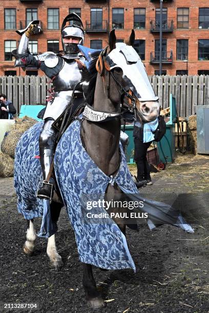 French knight Luc Petillot poses for a photograph during preparations for the International Jousting Tournament event at The Leeds Armouries, in...