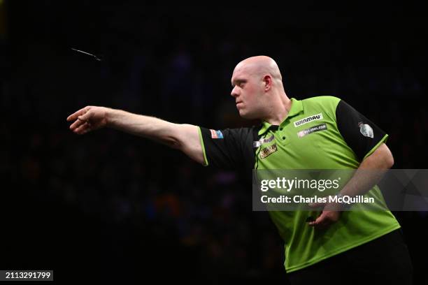 Michael van Gerwen in action during the second quarterfinals match against Michael Smith at The SSE Arena Belfast on March 28, 2024 in Belfast,...