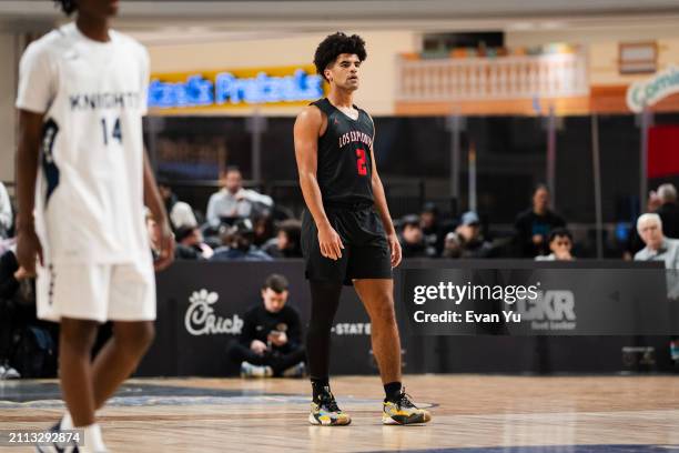 Cayden Boozer of the Columbus Explorers looks on during the game against the Notre Dame Knights during The Throne high school basketball tournament...