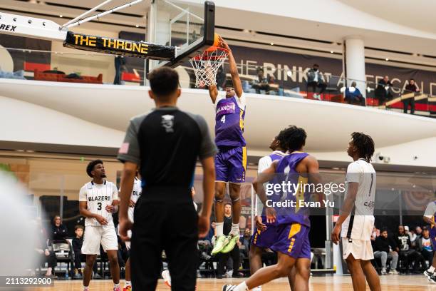 Alijah Curry of Camden Avalanche dunks the ball during the game against the Ridge View Blazers during The Throne high school basketball tournament on...