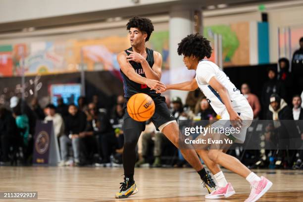 Cayden Boozer of the Columbus Explorers passes the ball the game against the Notre Dame Knights during The Throne high school basketball tournament...