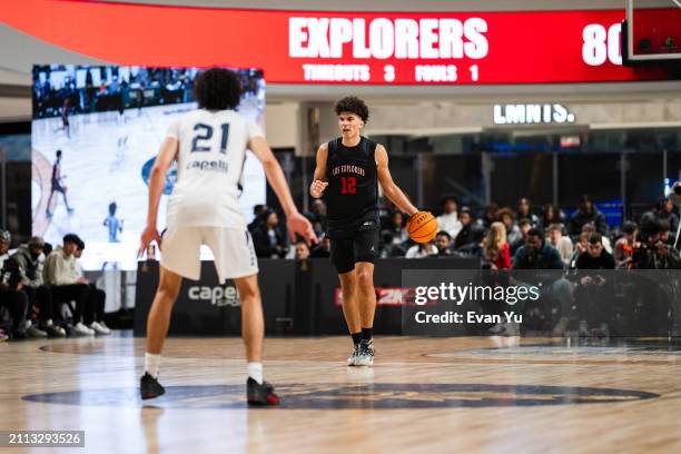 Cameron Boozer of the Columbus Explorers dribbles the ball during the game against the Notre Dame Knights during The Throne high school basketball...