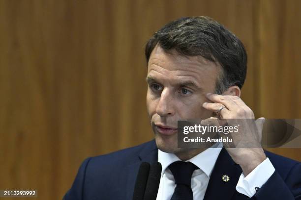 French President Emmanuel Macron and Brazilian President Luiz Inacio Lula da Silva hold a joint press conference after their meeting at the Planalto...