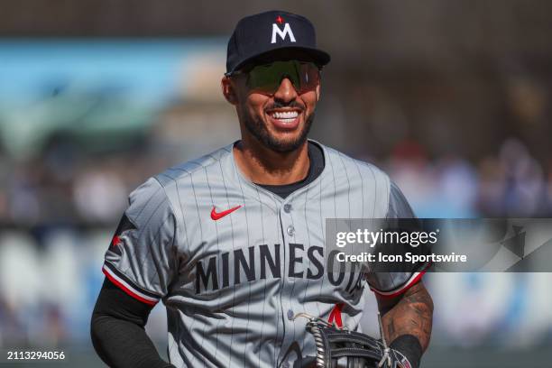 Minnesota Twins shortstop Carlos Correa smiles between innings during an MLB Opening Day game between the Minnesota Twins and Kansas City Royals Mar...