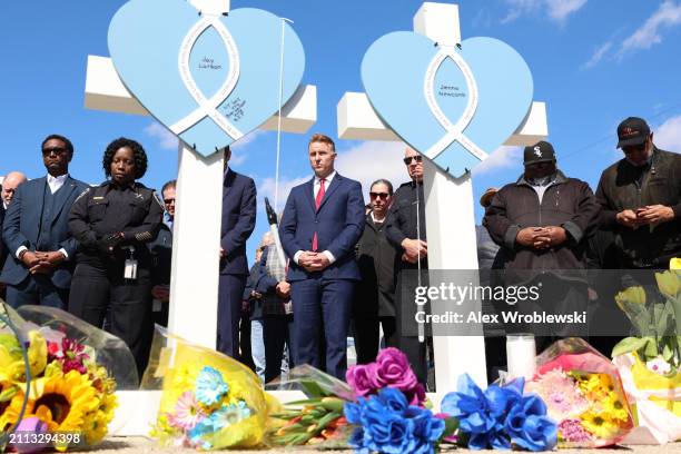 Community members gather at a vigil to remember victims of a recent deadly stabbing attack on March 28, 2024 in Rockford, Illinois. Four people were...