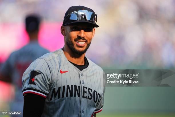 Carlos Correa of the Minnesota Twins looks on between the eighth and ninth inning during the game between the Minnesota Twins and the Kansas City...