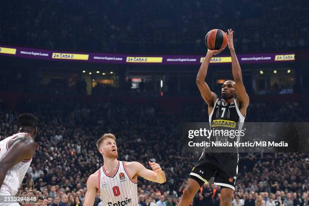 Kevin Punter of Partizan Mozzart Bet Belgrade shoots for three points during the 2023/2024 Turkish Airlines EuroLeague, Round 32 match between...