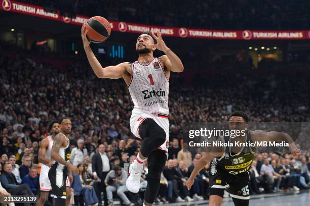 Nigel William-Goss of Olympiacos Piraeus competes against Perry Dozie JR of Partizan Mozzart Bet Belgrade during the 2023/2024 Turkish Airlines...