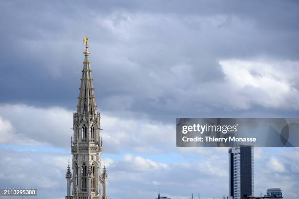 The arrow of the historical Brussels Town Hall is seen from the Roof Top of 'Brucity' the new building of Brussels administration, on March 28, 2024...