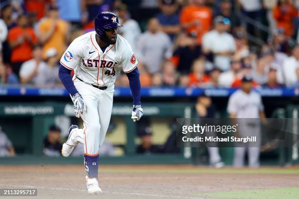 Yordan Alvarez of the Houston Astros singles in the ninth inning during the game between the New York Yankees and the Houston Astros at Minute Maid...