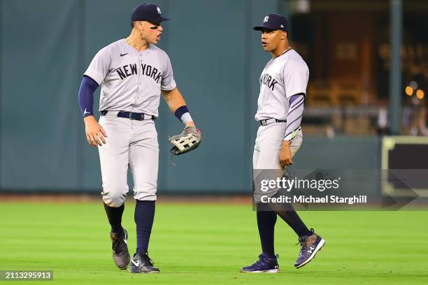 Aaron Judge and Juan Soto of the New York Yankees react to a replay review during the game between the New York Yankees and the Houston Astros at...