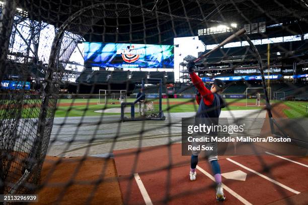Tyler O'Neill of the Boston Red Sox takes batting practice before the 2024 Opening Day game against the Seattle Mariners at T-Mobile Park on March...