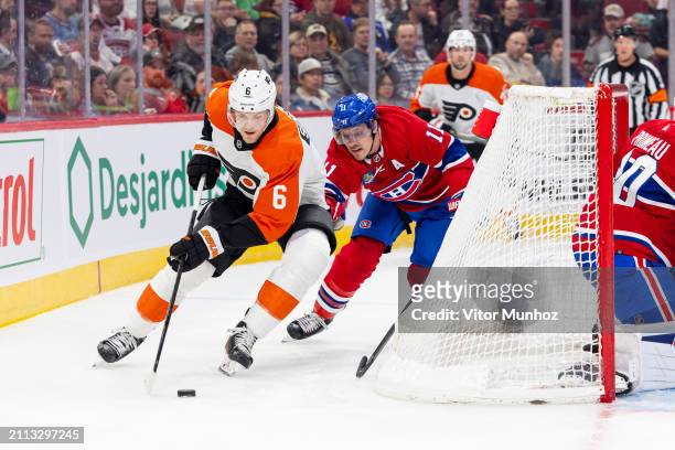 Travis Sanheim of the Philadelphia Flyers skates with the puck during the second period of the NHL regular season game between the Montreal Canadiens...