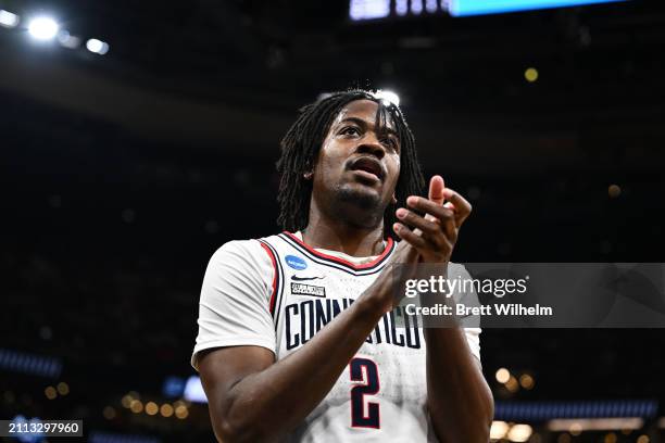 Tristen Newton of the Connecticut Huskies claps in between play against the San Diego State Aztecs during the first half of the Sweet Sixteen round...