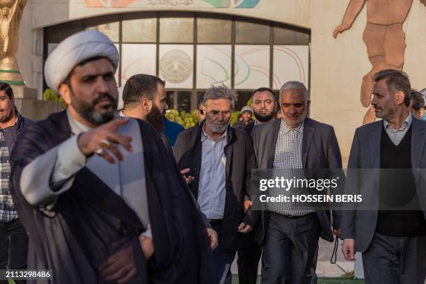 Ziyad al-Nakhalah , Secretary General of the Palestinian Islamic Jihad leaves after his speech during a rally in solidarity with Palestinians in...