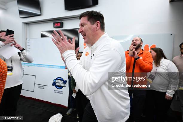 Head coach Brad Brownell of the Clemson Tigers celebrates the win in the locker room following the Sweet Sixteen round of the 2024 NCAA Men's...