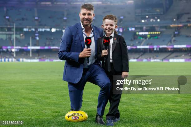 Dale Thomas and Archie Stockdale pose for a photo during the 2024 AFL Round 03 match between the North Melbourne Kangaroos and the Carlton Blues at...