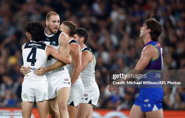 Oliver Hollands and Harry McKay of the Blues celebrate during the 2024 AFL Round 03 match between the North Melbourne Kangaroos and the Carlton Blues...