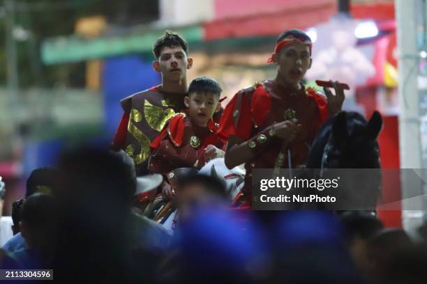 People are reenacting the Passion of Christ, which includes the scene of the washing of the feet, as part of the 181st representation of the Passion,...