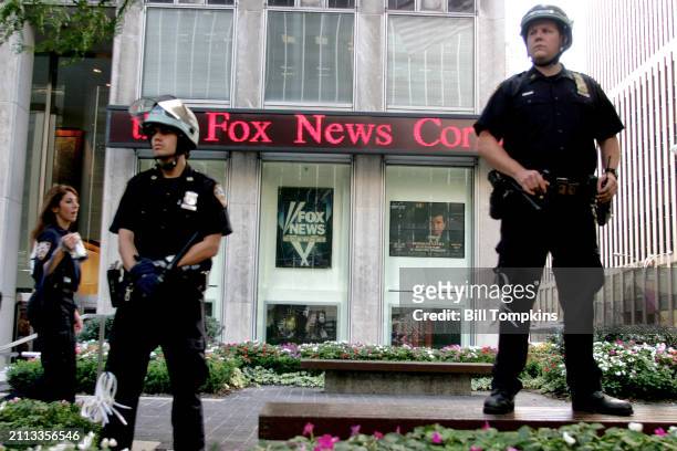 Over 1100 protestors were arrested today during the Republican National Convention in New York City Police standing in front of FOX NEWS guarding...