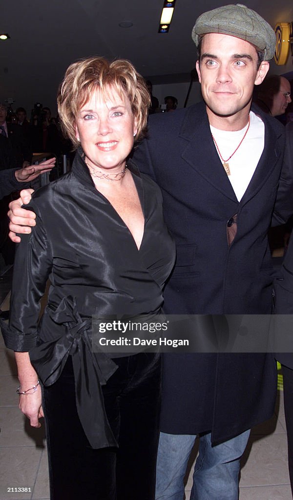 Robbie Williams and his mother at the premiere of Nobody Someday in the Warner cinema Shepherds Bush London on November 6th 2002
