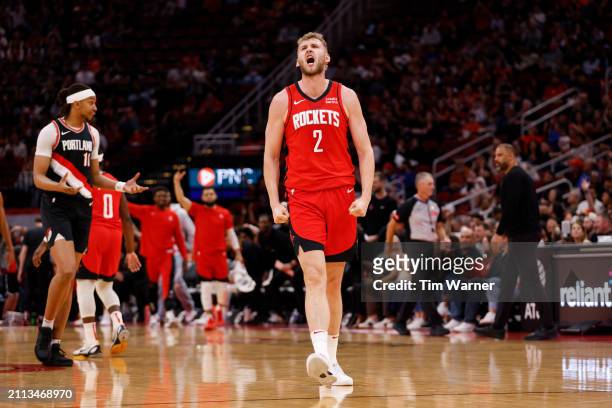 Jock Landale of the Houston Rockets reacts after making a three-point basket in the first half against the Portland Trail Blazers at Toyota Center on...