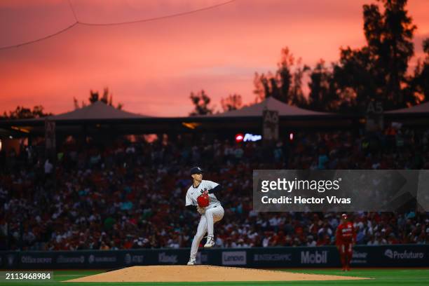 Luis Serna of the New York Yankees delivers a pitch in the second inning during Spring Training Game Two between Diablos Rojos and New York Yankees...