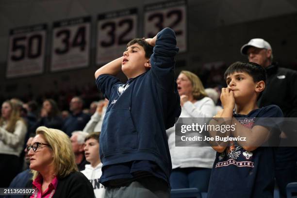 Connecticut Huskies fans react during the second half of a second round NCAA Women's Basketball Tournament game against the Syracuse Orange at the...