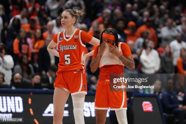 Georgia Woolley and Dyaisha Fair of the Syracuse Orange react during the second half of a second round NCAA Women's Basketball Tournament game...