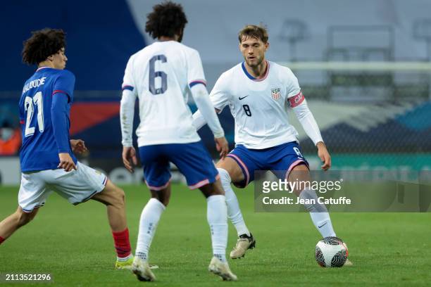 Tanner Tessmand of USA, left Maghnes Akliouche of France in action during the U23 international friendly match between France U23 and USA U23 at...