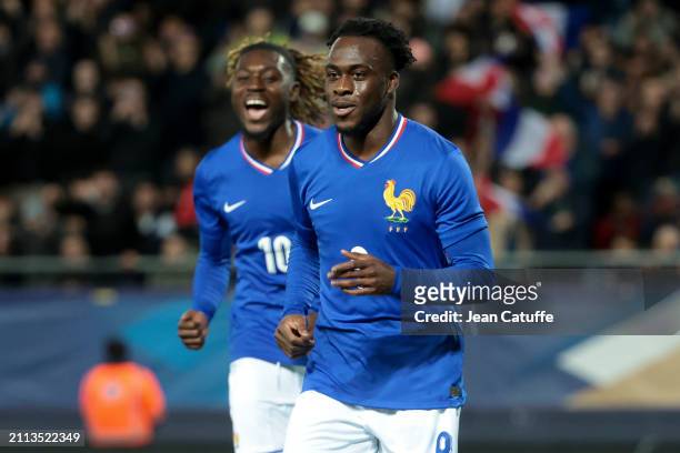 Arnaud Kalimuendo of France celebrates his goal with Manu Kone during the U23 international friendly match between France U23 and USA U23 at Stade...
