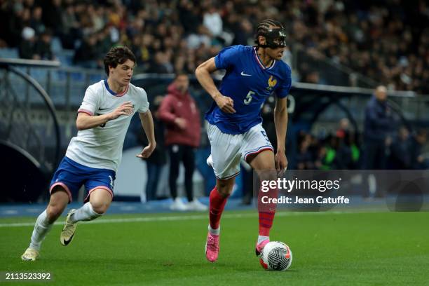 Kiliann Sildillia of France, left Paxten Aaronson of USA in action during the U23 international friendly match between France U23 and USA U23 at...