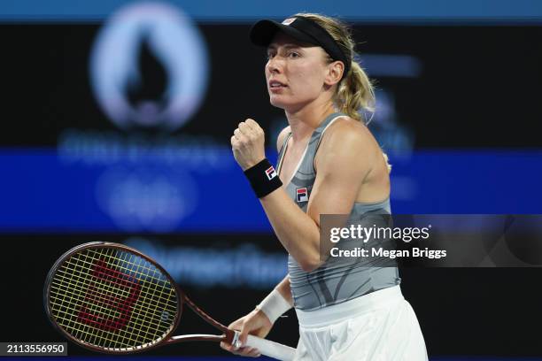 Ekaterina Alexandrova reacts during her women's singles match against Iga Swiatek of Poland during the Miami Open at Hard Rock Stadium on March 25,...