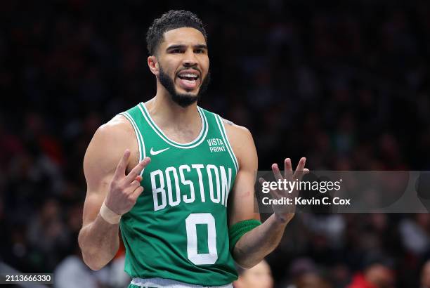 Jayson Tatum of the Boston Celtics reacts to a call against the Atlanta Hawks during the fourth quarter at State Farm Arena on March 25, 2024 in...