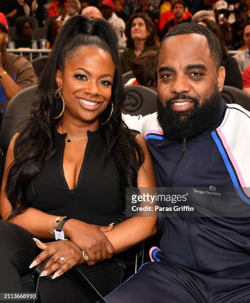 Kandi Burruss and Todd Tucker attend the game between the Boston Celtics and the Atlanta Hawks at State Farm Arena on March 25, 2024 in Atlanta,...