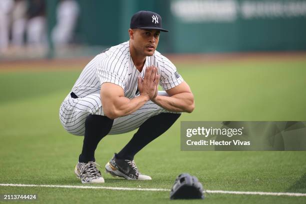 Giancarlo Stanton of the New York Yankees warms up prior Spring Training Game Two between Diablos Rojos and New York Yankees at Estadio Alfredo Harp...